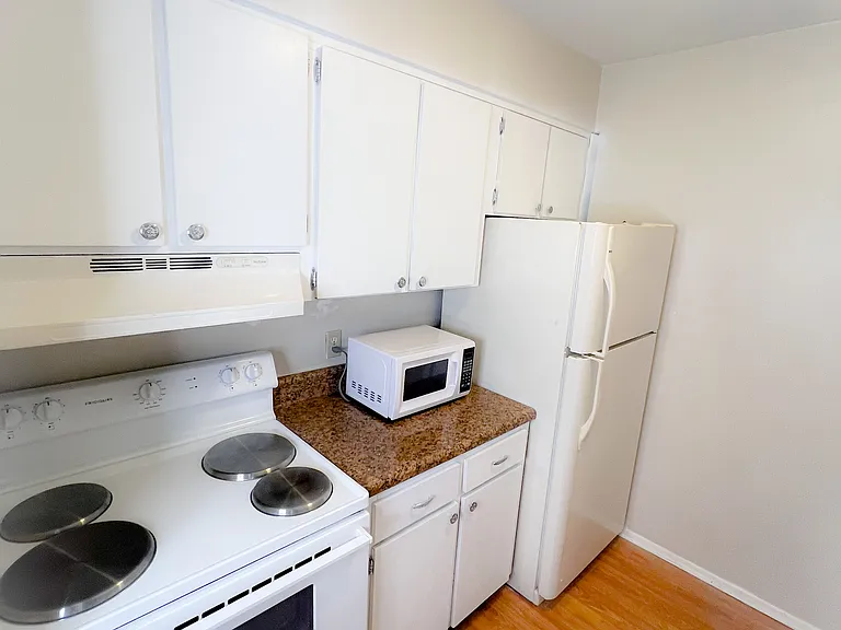 Unit is unfurnished and photos are staged. Furniture not included.