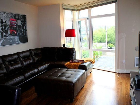 Living room with floor to ceiling windows