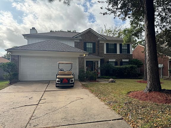 Front of house with attached garage