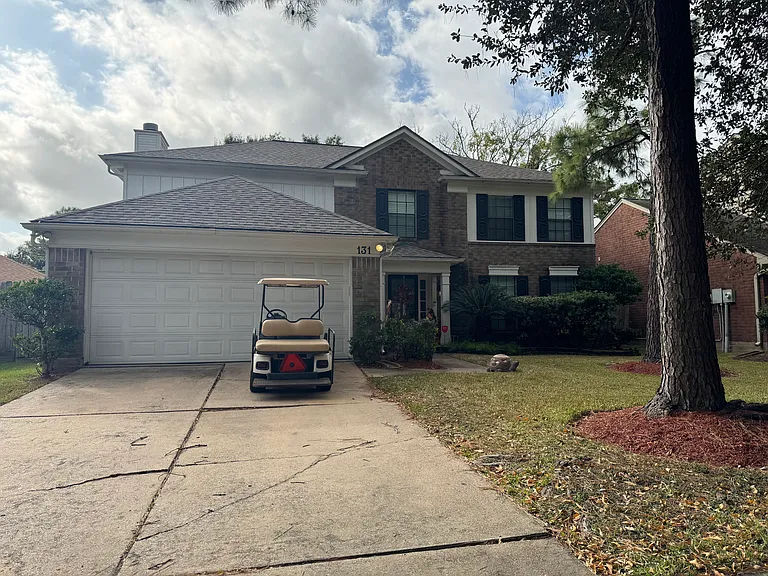 Front of house with attached garage