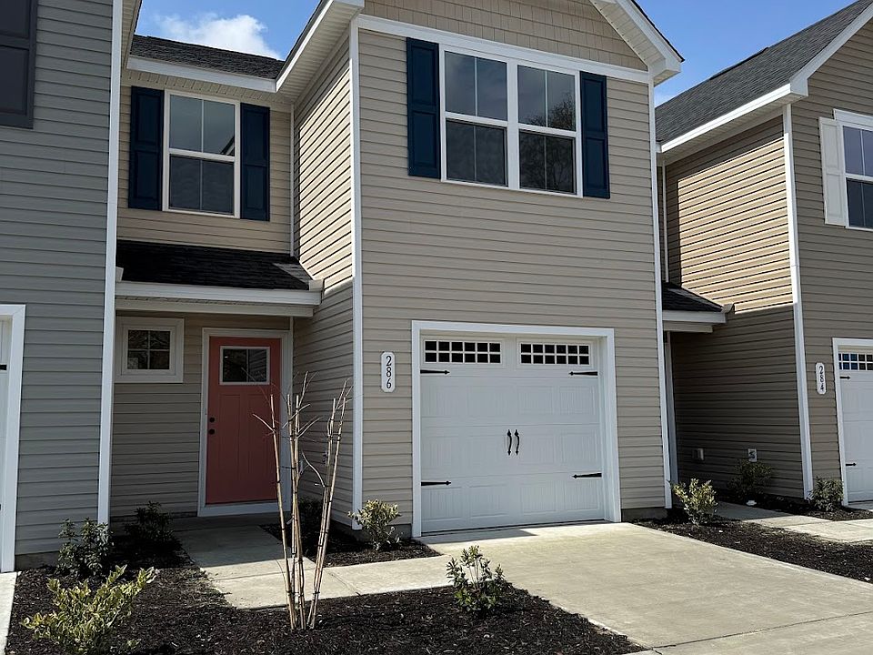Beautiful NEW home w/ Garage and lots of driveway.