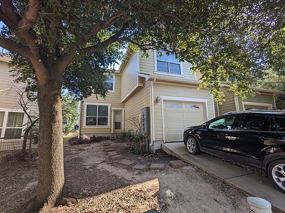 The back of the house, 1 car garage, attached