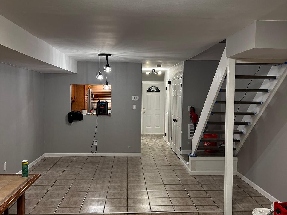 Newly renovated living room, dining room and entryway (kitchen to the left of the front door)
