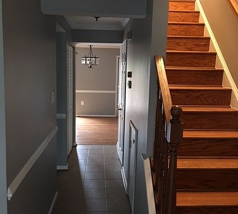 Entry hallway with stairs to second level.