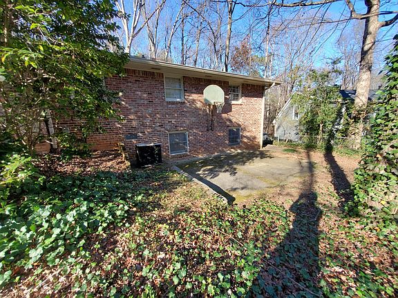 Small basketball court in backyard