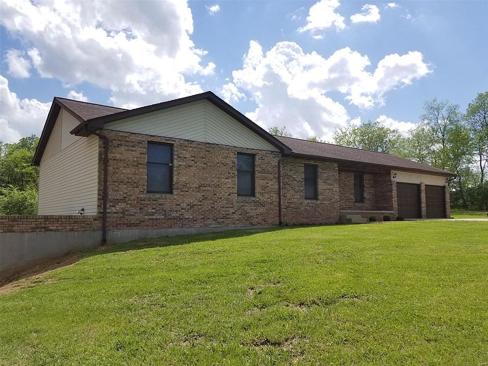 Ranch home on 3 acres, private lane that is well maintained by the owners on Rose Lane. Assessment is $100.00 year (2-payment op