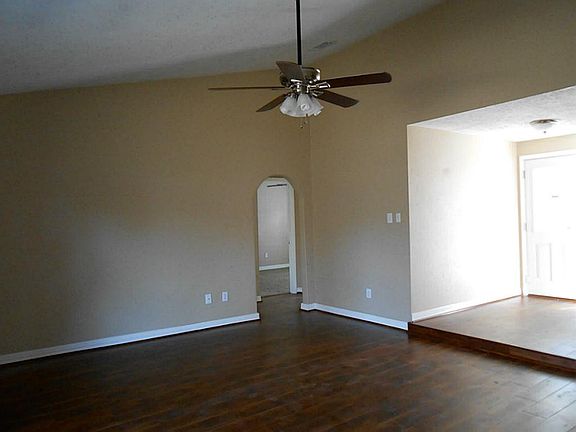 Premium quality laimnate flooring in entry, living room and hall.