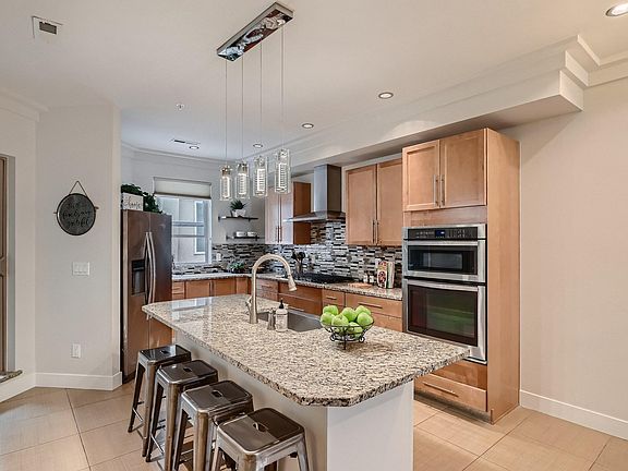 Kitchen with granite countertops and soft close cabinets