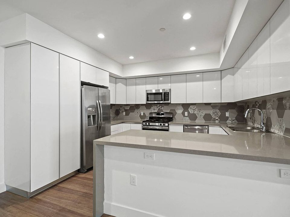 Large-Size Kitchen with Ample Cabinet and Storage and Counter Space