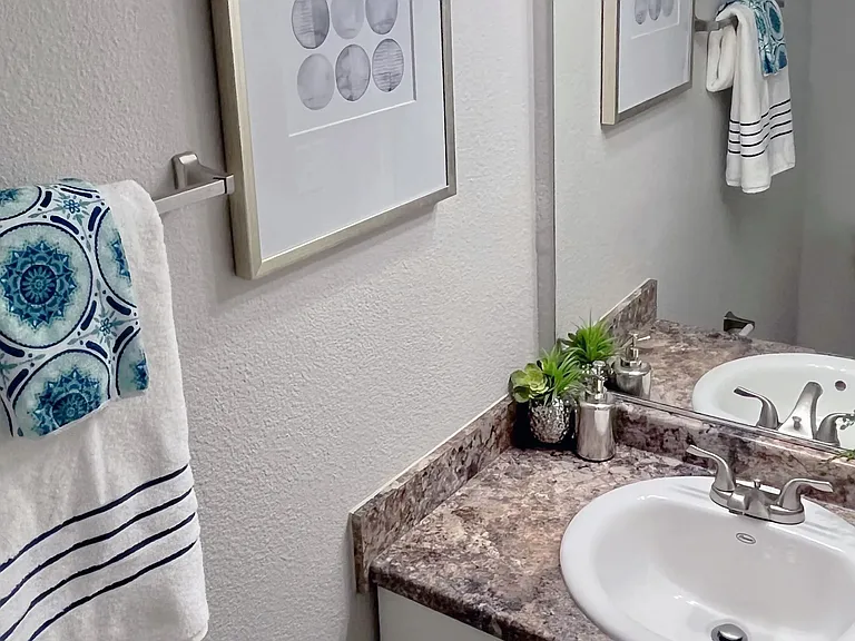 Select floor plans feature a convenient half bath for pure convenience.