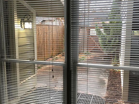 View from Living Room of Front Courtyard, Front Door