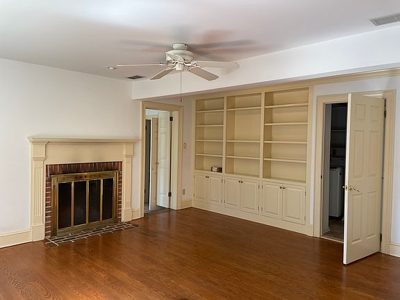 Family room with built in bookshelves