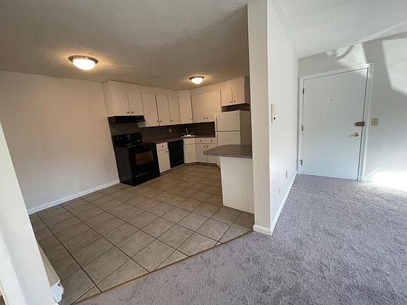 Kitchen & Living Room with Eat In Kitchen Area