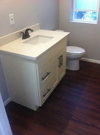 Bathroom sink/vanity and toilet