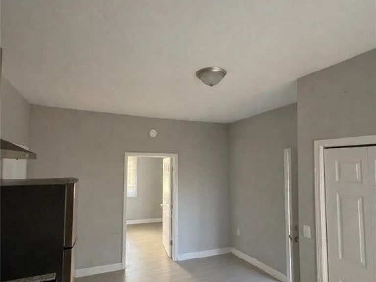 Kitchen showing view of Laundry room on the immediate right and Master Bedroom entranceway.