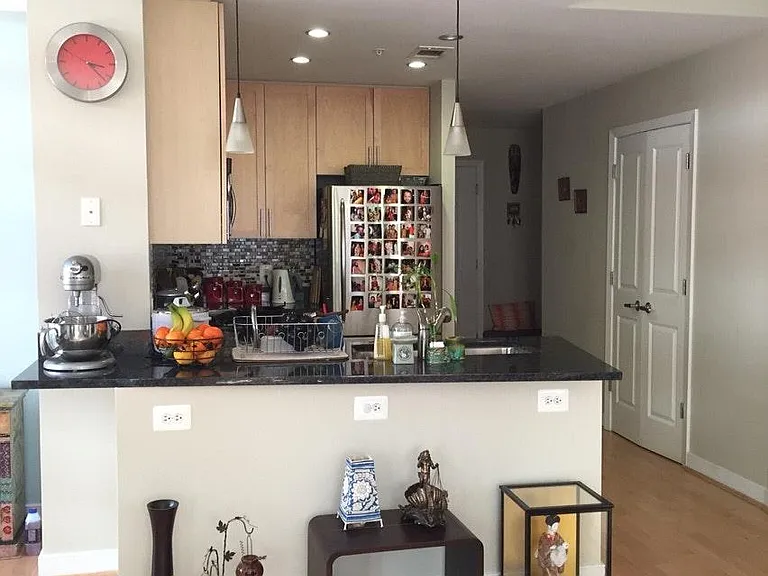 View of kitchen from living area