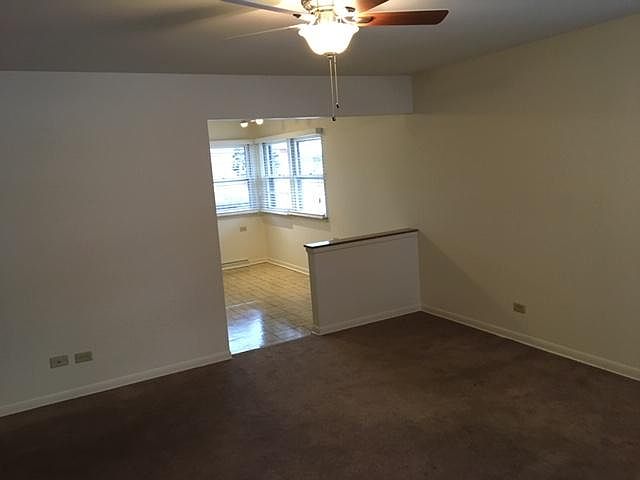 Spacious living room with entry closet and oversized linen closet