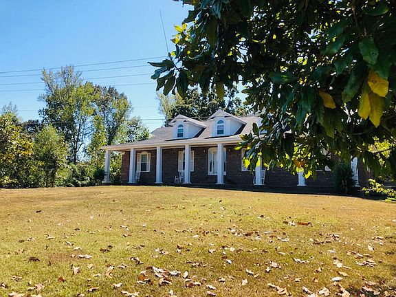 Surrounded by mature trees.