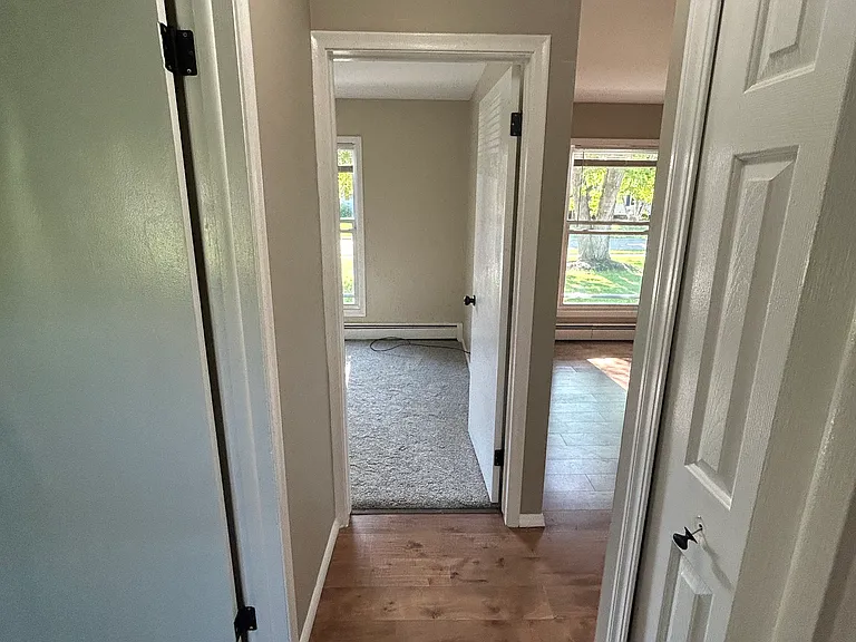 Hall, look at bedroom 1 and living room