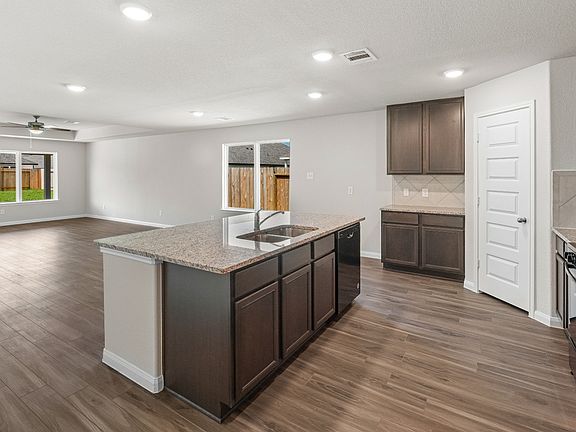 Kitchen to Family Room and Dining Area