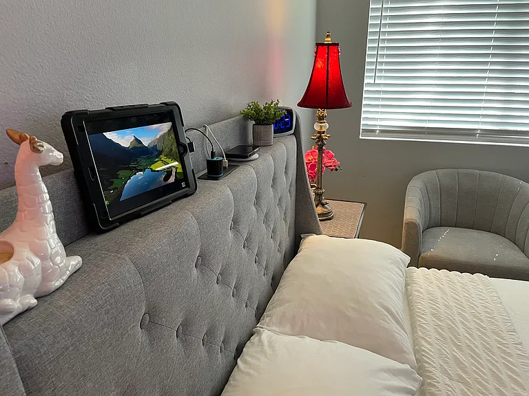 Bed with built-in USB ports and standard outlets