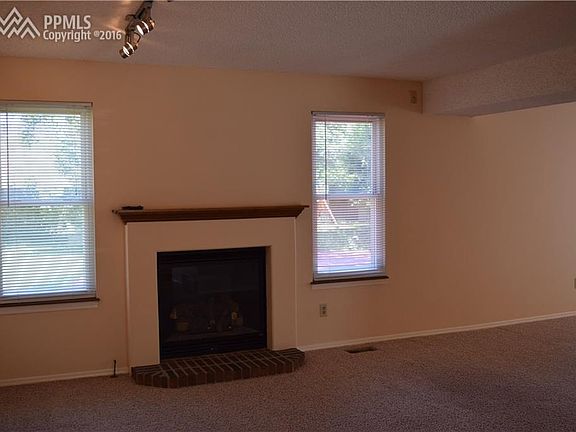 Light,  bright Family room...gas log fireplace 3yrs old...