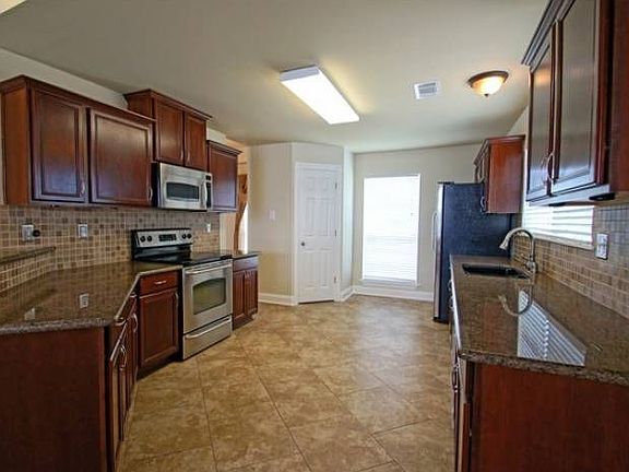 Kitchen w/SS Appliances