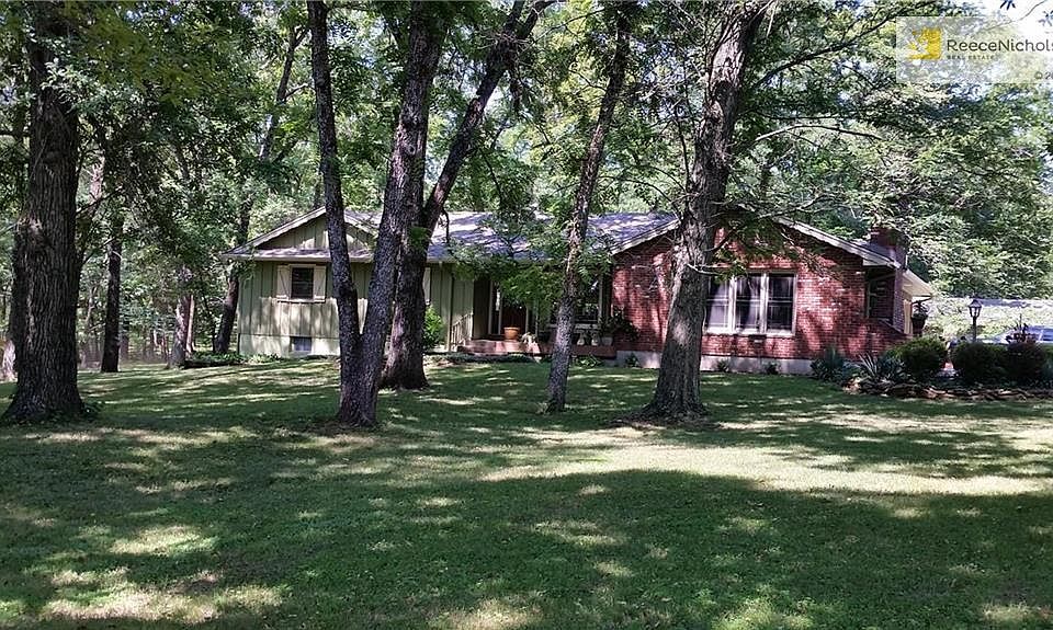 A wonderful ranch-style home surrounded by woods!