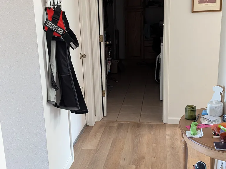 Entry way and door to laundry room/office space