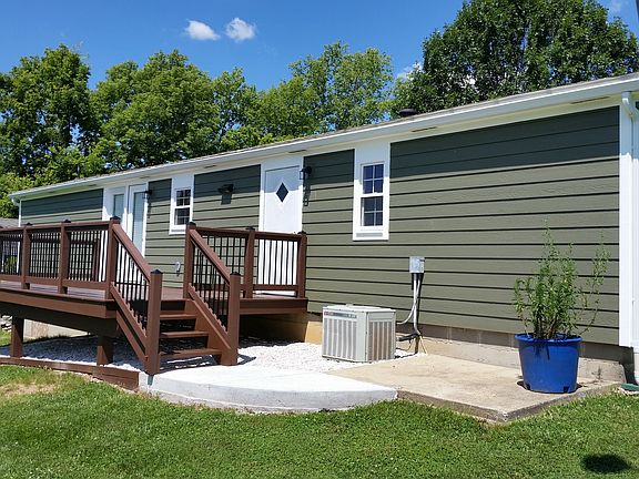 Back view of home with deck