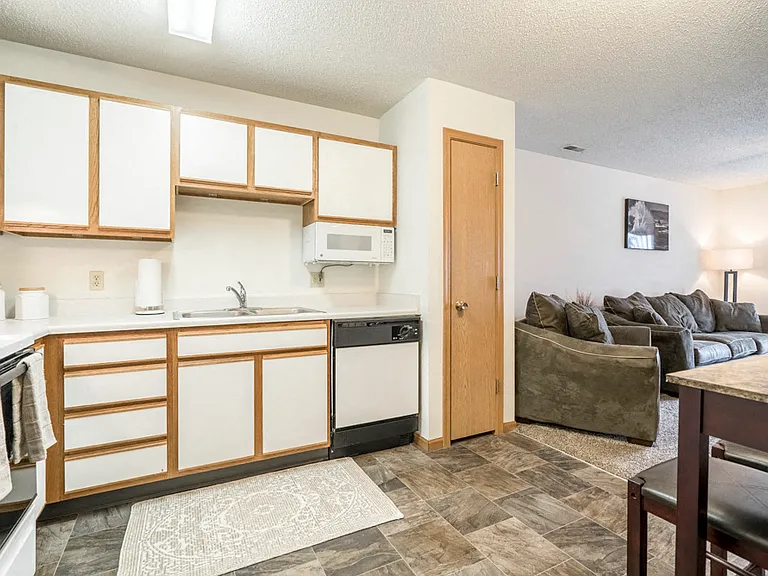 Enjoy lots of cabinets and a pantry for extra storage.