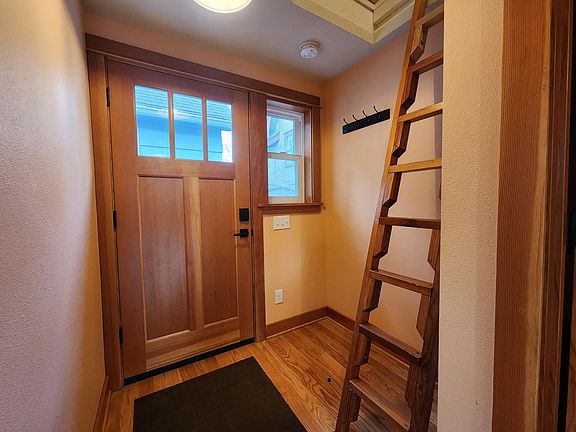 The Entry. Ladder to attic loft.