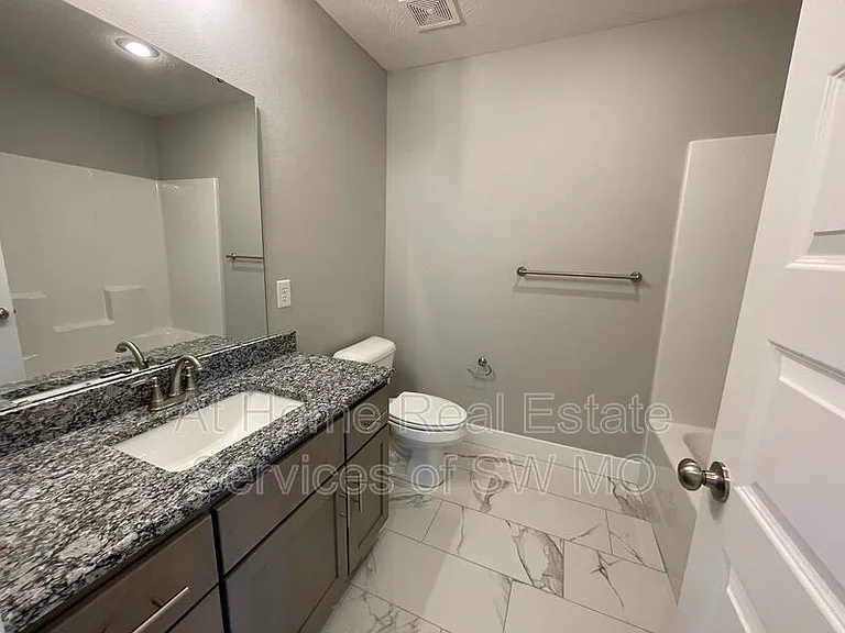 5943 S Iris Ln — Photo 14