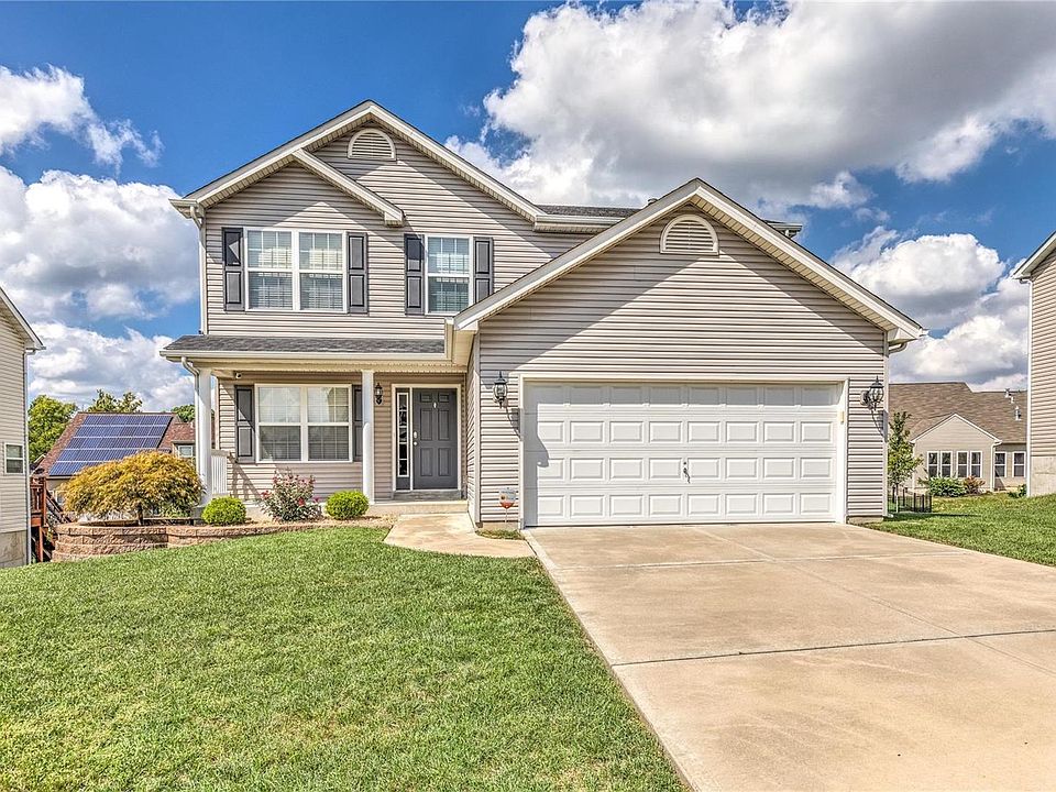 Welcome to 417 Morrow Glen Dr. situated in the Addyston Place subdivision with its professional landscaping, architectural shing