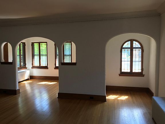 Living room showing sunroom and additional area