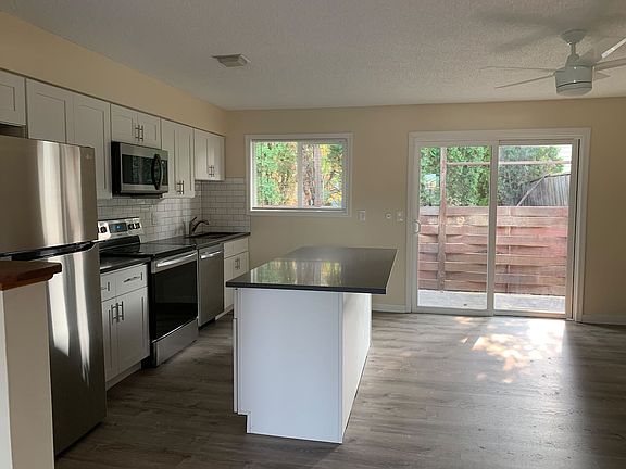 Kitchen, dining area and private patio