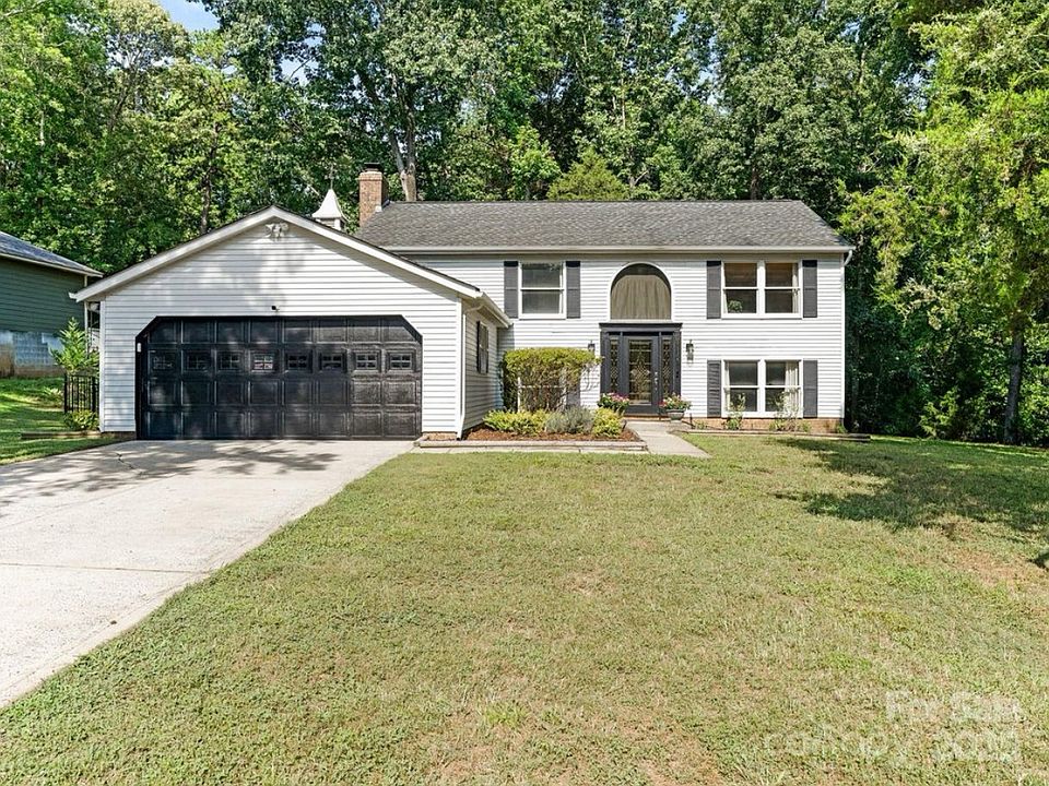 Flat driveway with spacious two car garage