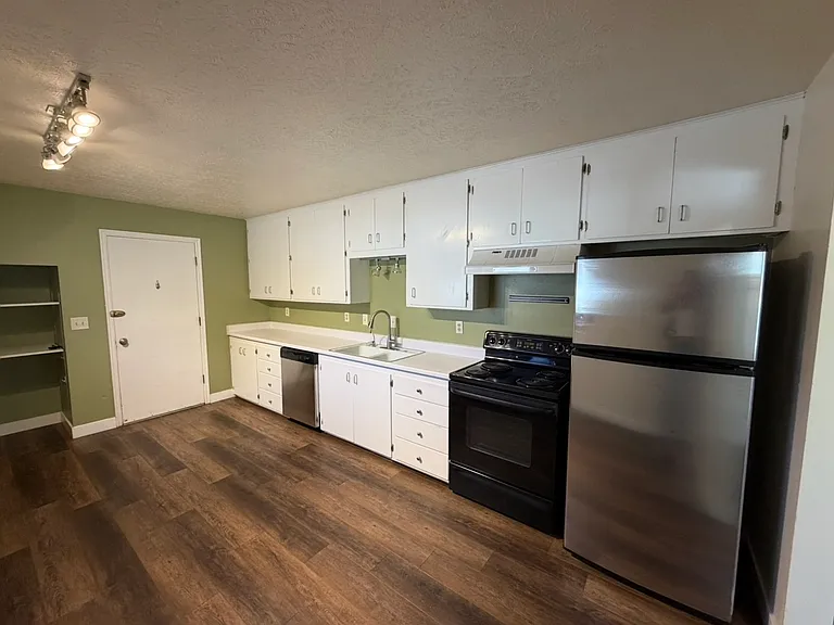 Kitchen to the left of the front door, Garage access as well