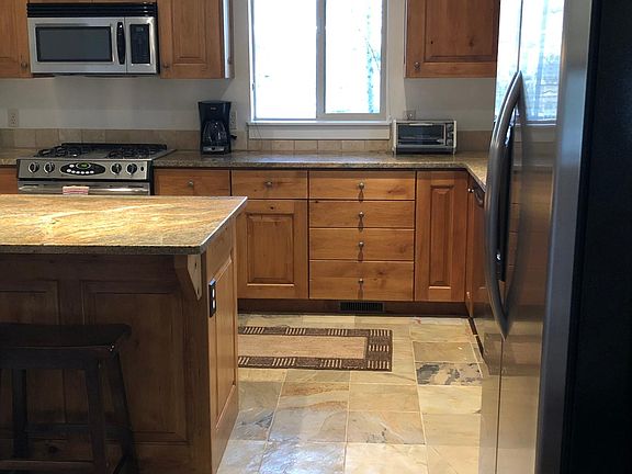 Entrance way leading into the kitchen.