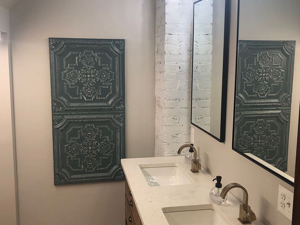 3rd Floor Bathroom. Laundry is located across from the vanity.