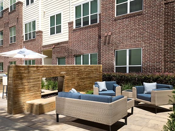 Outdoor lounge with fireplace