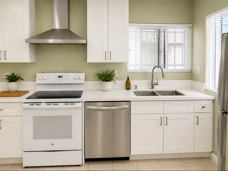 BRAND NEW remodeled kitchen, new countertops, cabinets, sink, faucet, blinds and appliances