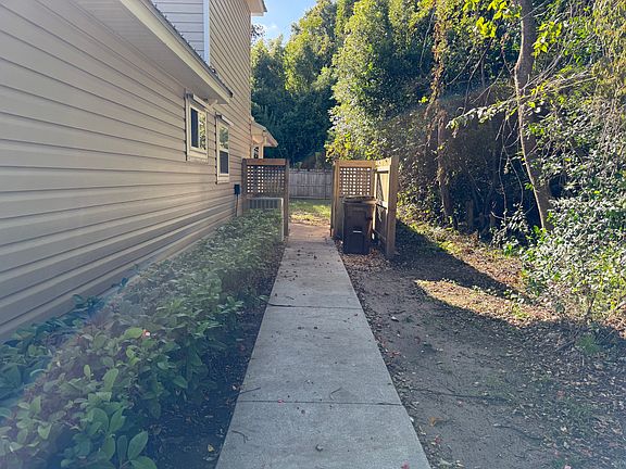 Sidewalk to property in back