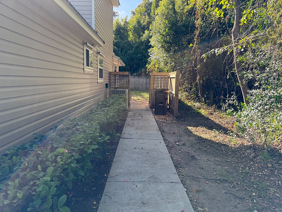 Sidewalk to property in back