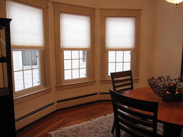 Dining windows with insulating shades