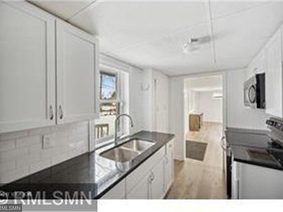 4th image of 5825 Decatur Ave N