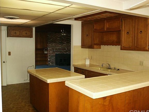 5th image of 5029 N Langham Ave