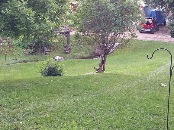 Yard and year-around creek.