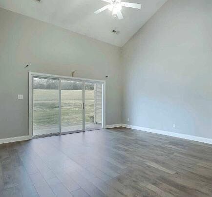LIVING ROOM WITH GLASS DOOR TO BACK PATIO