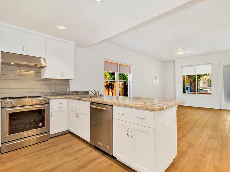 Kitchen facing out to Living Area